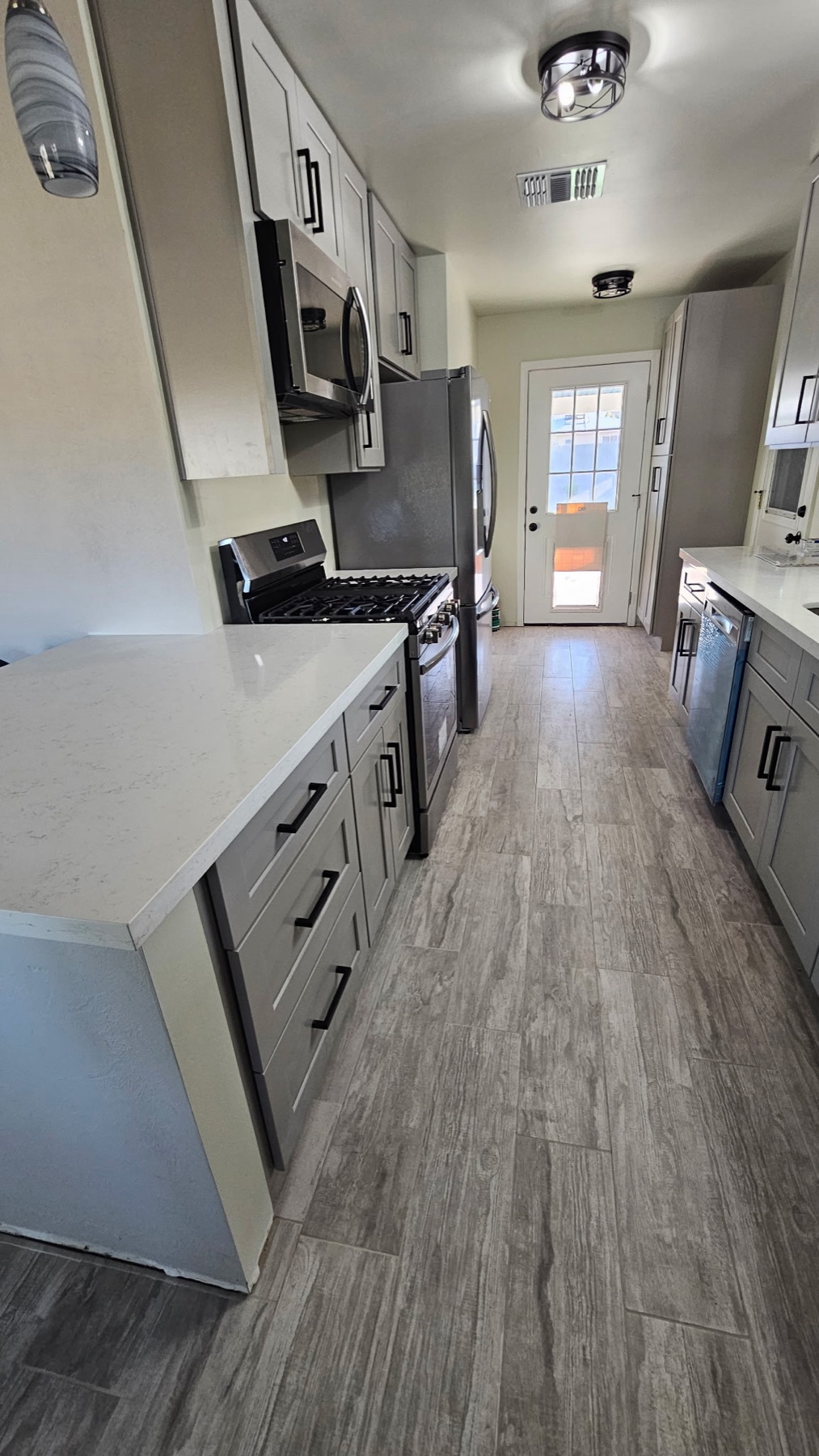 Finished East Valley kitchen remodel with custom cabinetry and island